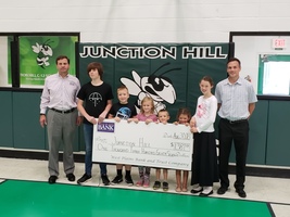 Students accept donation from West Plains Bank